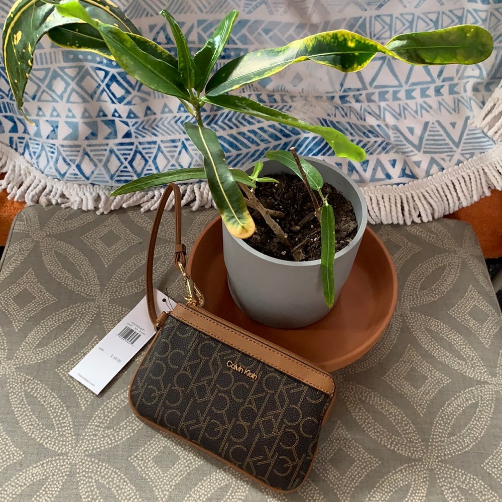 Calvin Klein wristlet brown